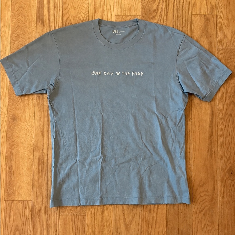 Uniqlo Men's Light Blue 'One Day in the Park' Graphic Tee